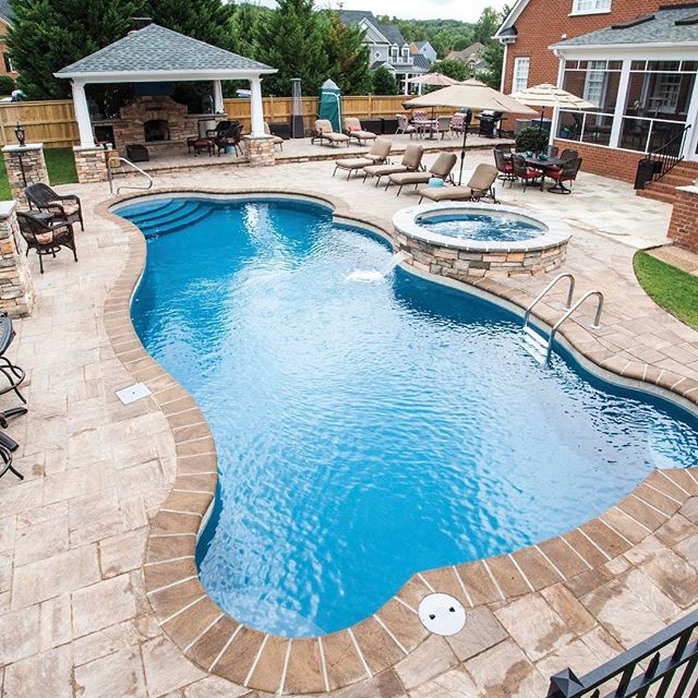 get out of the stone age fiberglass pool benefits - freeform pool with spa
