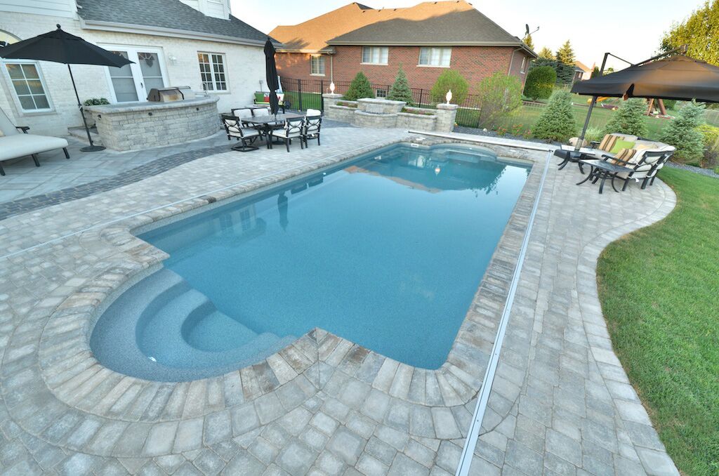 Customizable swimming pool steps with vinyl over polymer or steel