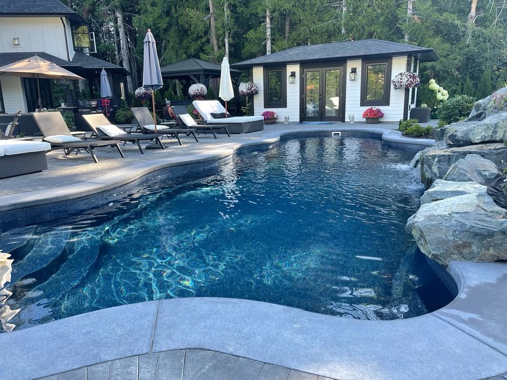 large freeform fibreglass pool in British Columbia backyard